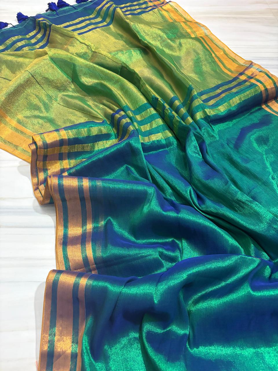 Peacock hues Tissue cotton saree